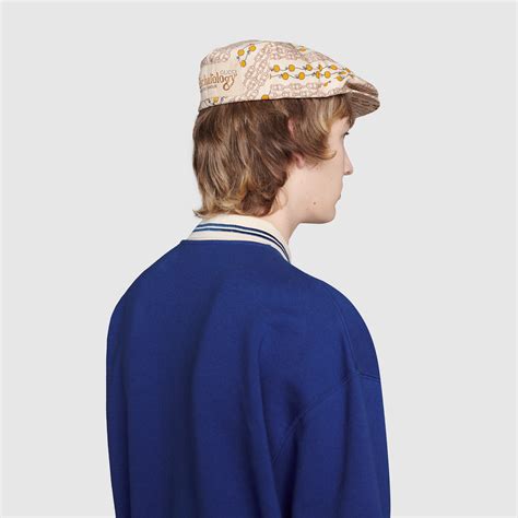 Gucci Casquette plate avec étriers et pomme GG